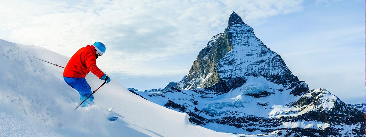 5 Winter Destinations - a ski run with a view of the Matterhorn