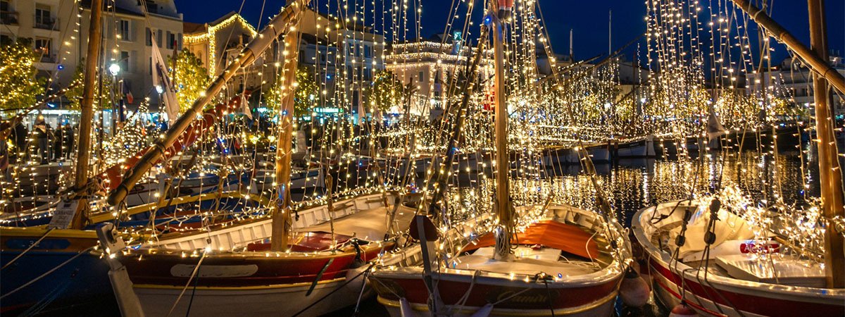 France Christmas markets – Boats decorated with lights in south of France France Christmas markets - Boats decorated with lights in south of France